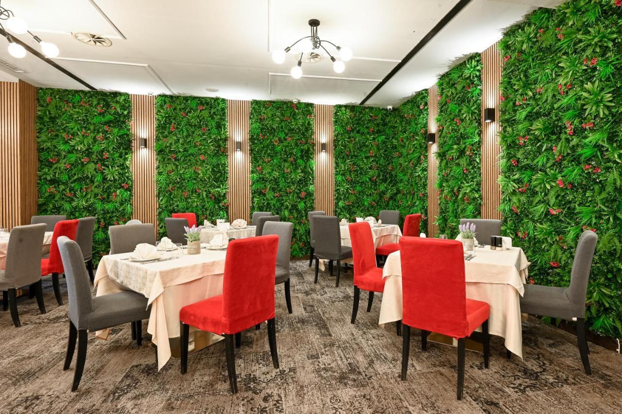 グランド ホテル ヴェリングラド ヴェリングラード エクステリア 写真 Interior of the restaurant